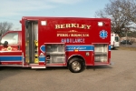 left side view of truck with open compartments