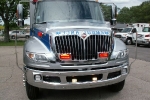 front of truck, reading \"AMBULANCE\"