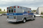 truck reads \"Boston Med Flight\". It\'s chrome in color with a blue horizontal stripe down the middle