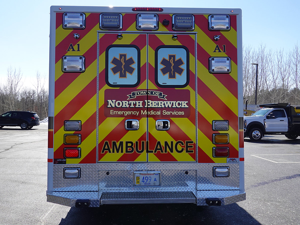 The closed back doors of the ambulance.
