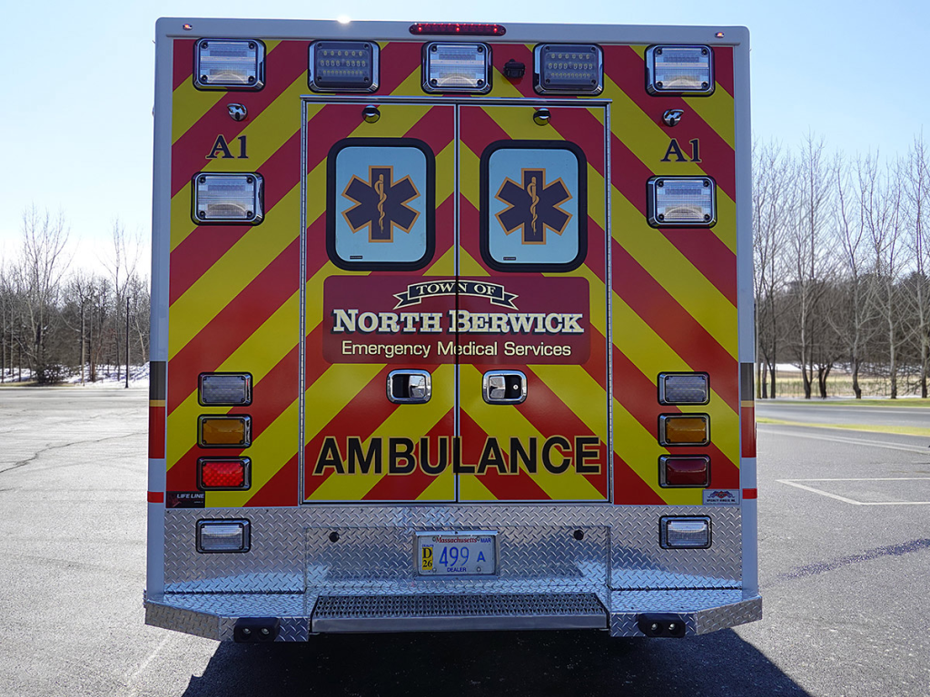 The closed back doors of the ambulance.
