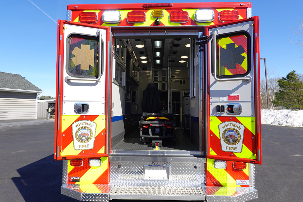 The back doors are open to the patient care area.