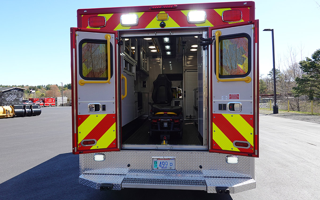 The back doors are open to the patient care area.