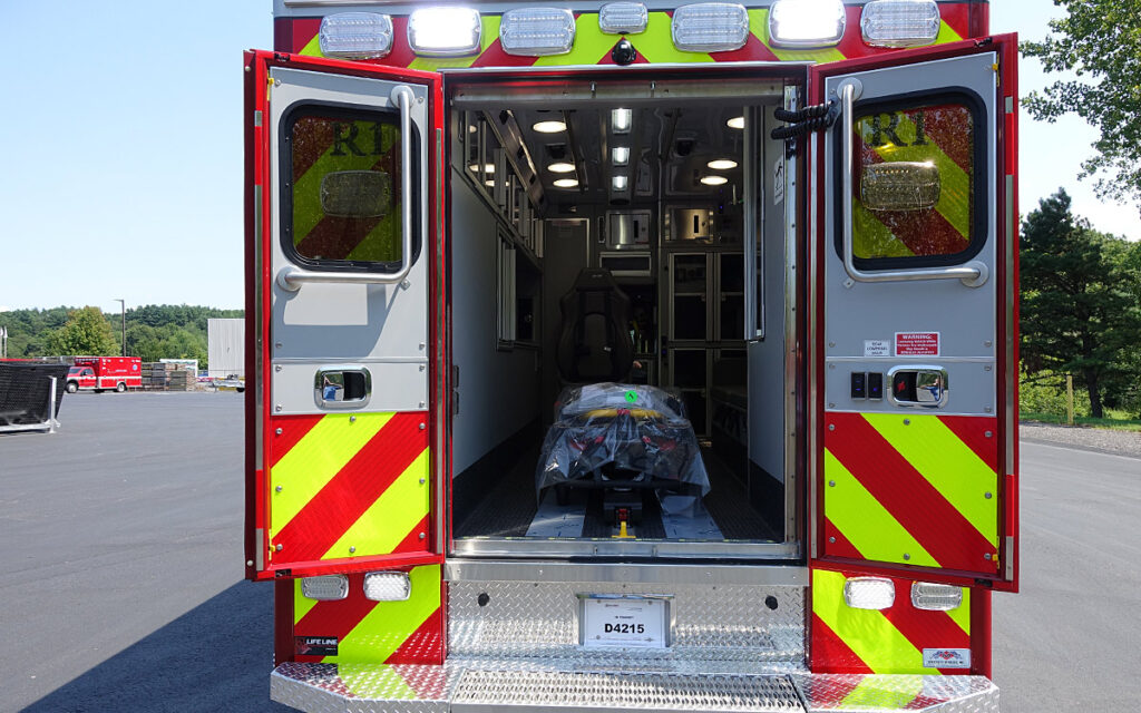 The back door is open to the patient care area.