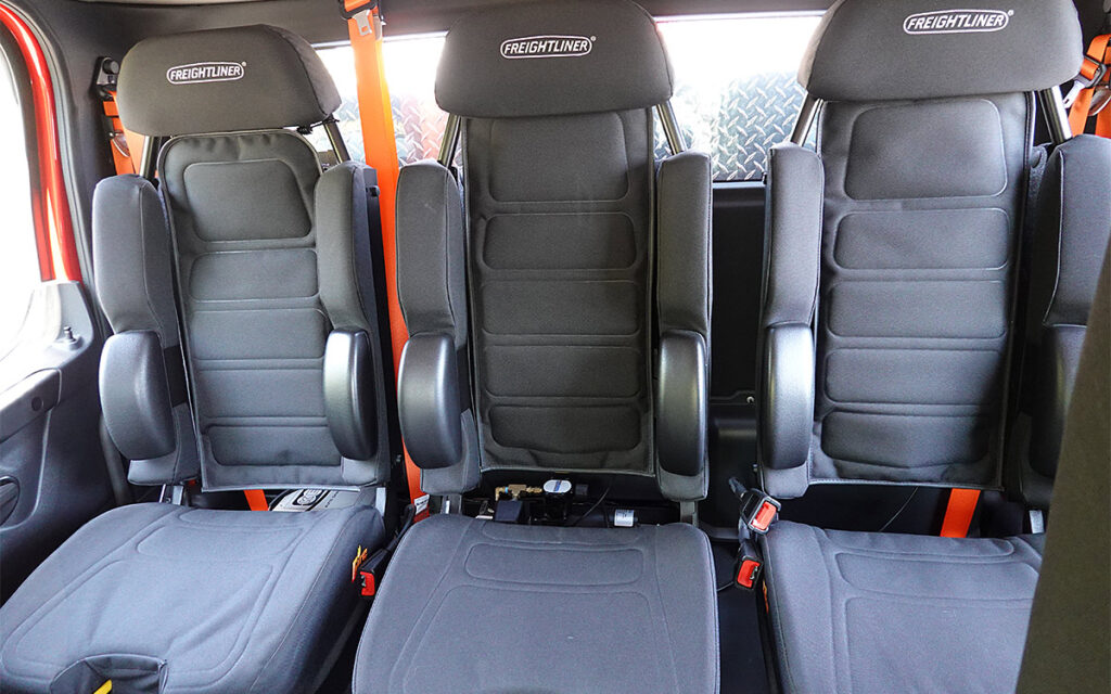 Inside seating (3) behind driver area.
