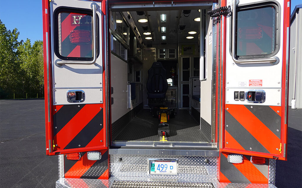 The back doors are open to the patient care area.