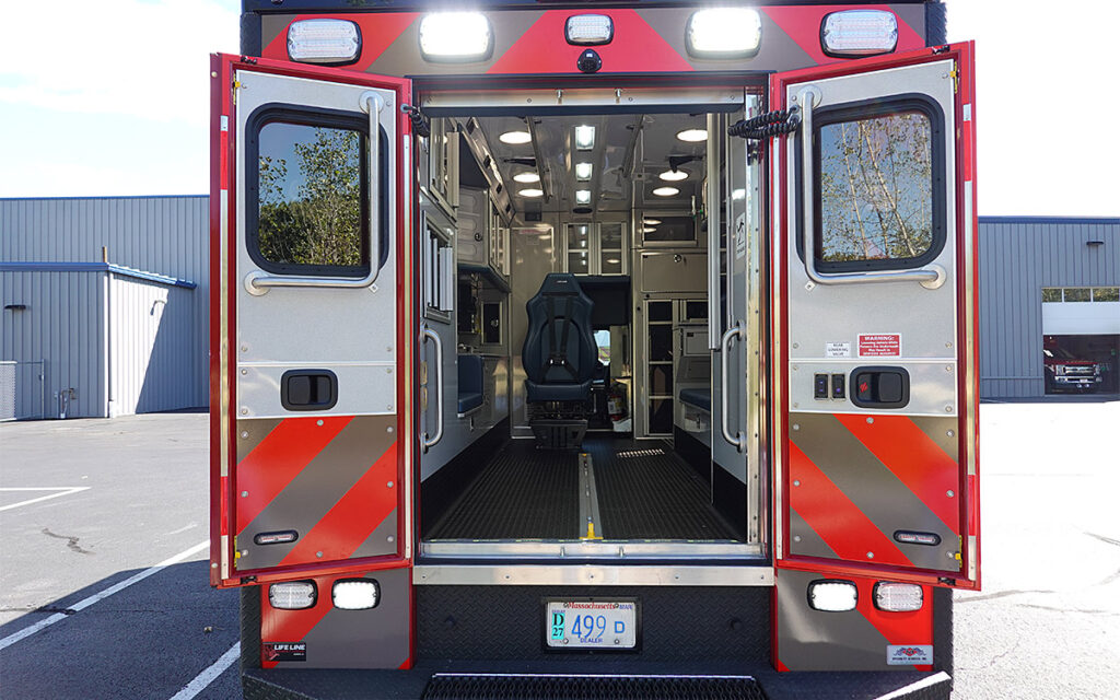 The back doors are open to the patient care area.