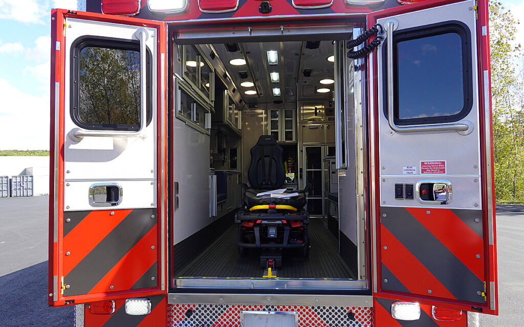 The back door is open to the patient care area.