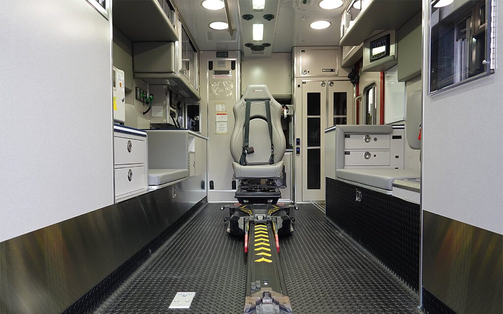 The back doors are open to the patient care area.